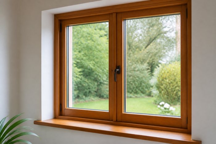 Restored wooden window frame with a clean sealed finish